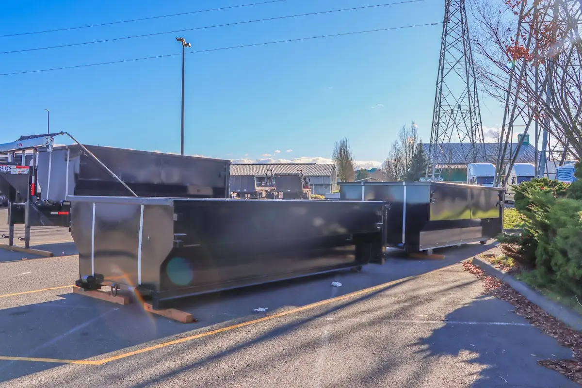 Roll-off dumpster ready for waste disposal at job site for Demolition Dumpster Rental in Cortland